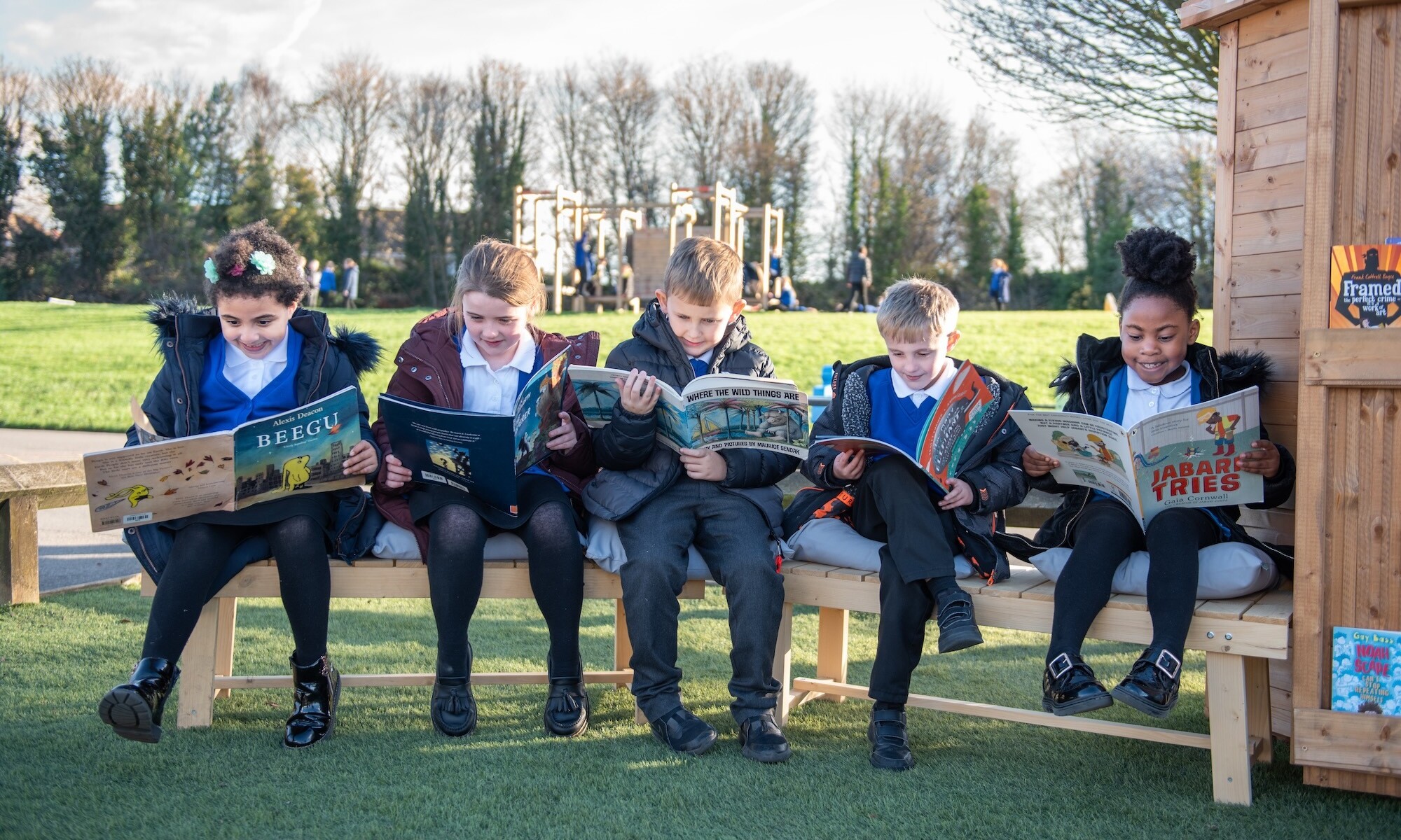 The Exchange Partnership - Pupils Reading Outside